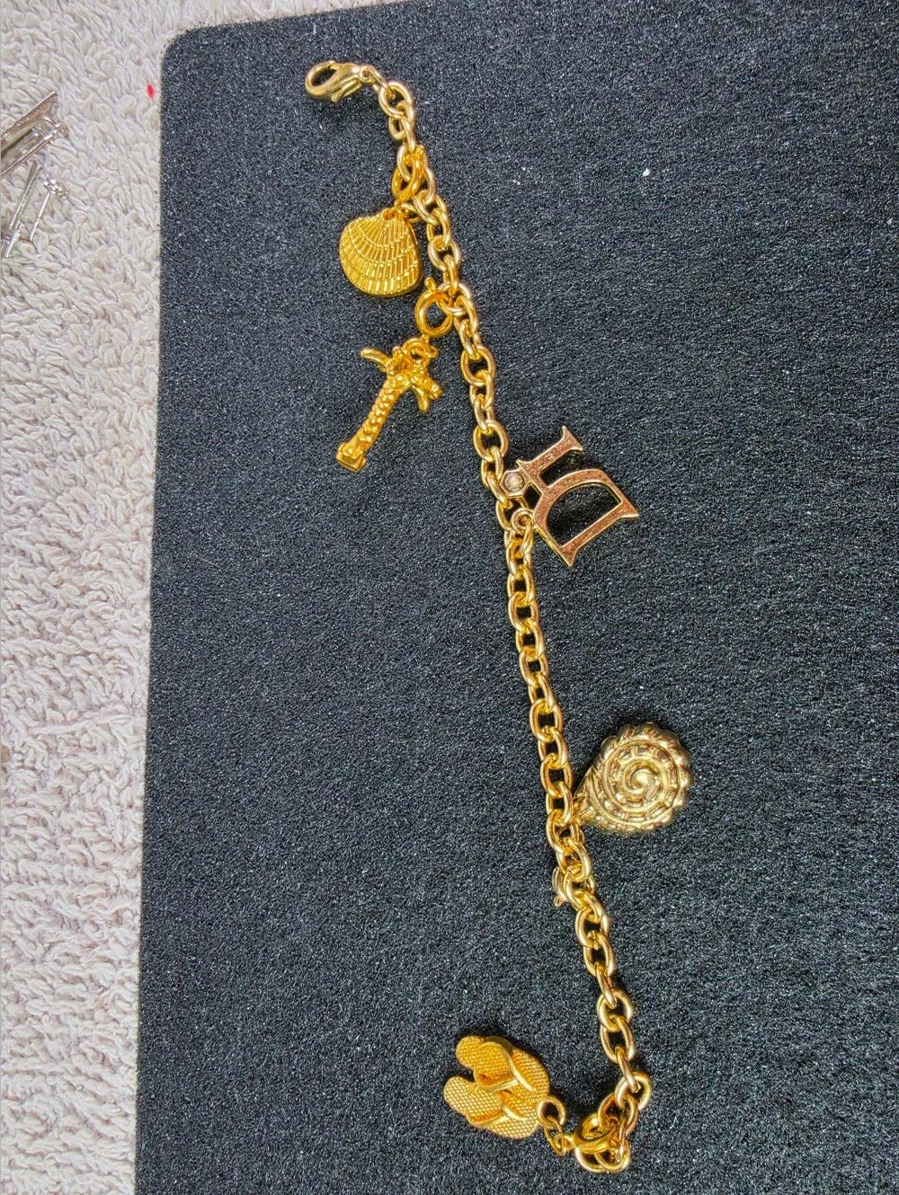 Gold Charm Bracelet with 'Di' Letter and Sea-themed Charms